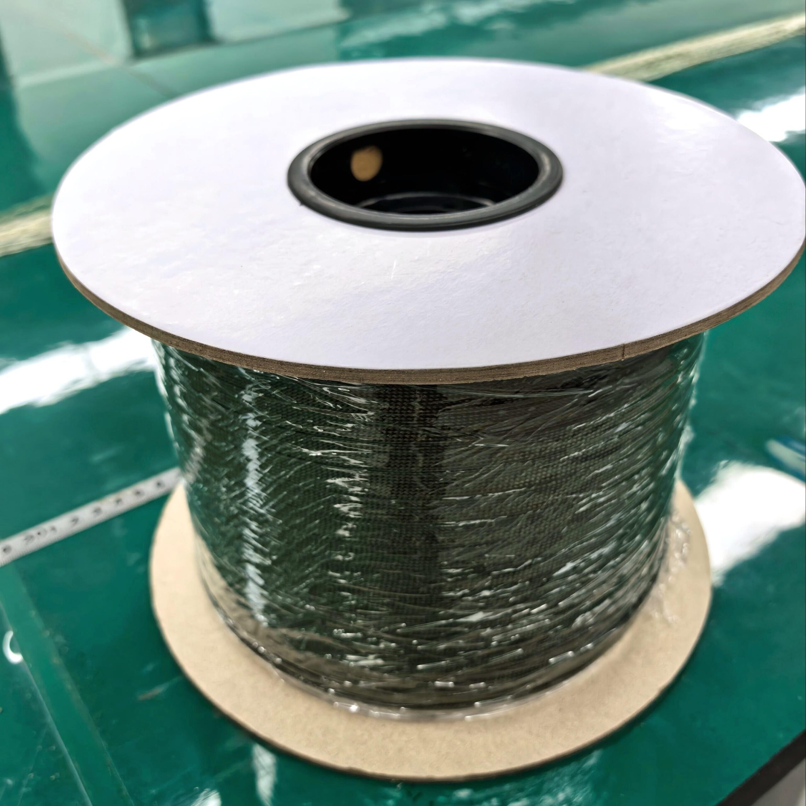 Meta-Aramid Braided Sleeving wrapped around paper reel