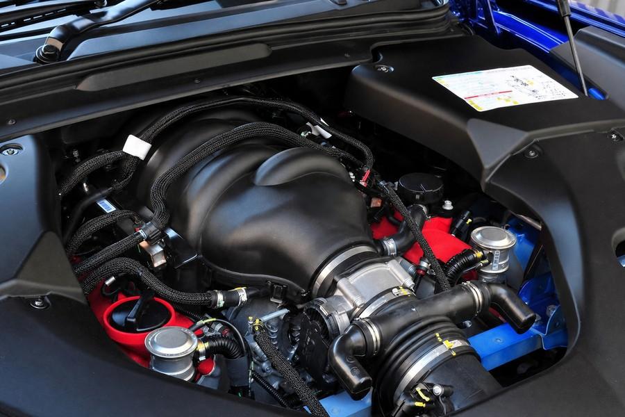 Black PET braided sleeving protecting a general under-hood automotive wire harness